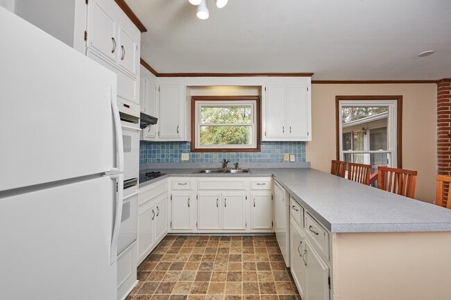 Photo - Coming Soon : 3+BR, 2BA house with extra finished and unfinished spaces.