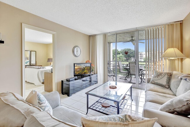 Building Photo - 9311 Orange Grove Dr Unit 210