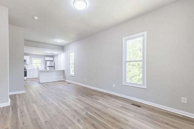 Photo - Remodeled 2-Bedroom Bungalow with Spacious Yard & 1-Car Basement Garage