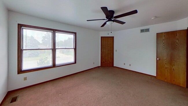 Photo - Duplex with two large bedrooms, walk in closet, 1.5 bath, full basement, lawn and snow removal in...