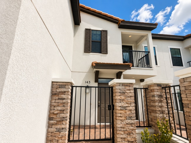 Building Photo - Charming 2-Bed Townhouse with Granite Elegance in Haines City – Spacious 1,464 Sq. Ft. Retreat!