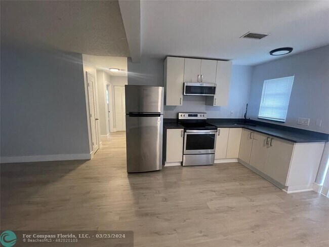 Photo - 780 NE 46th Ct Condo