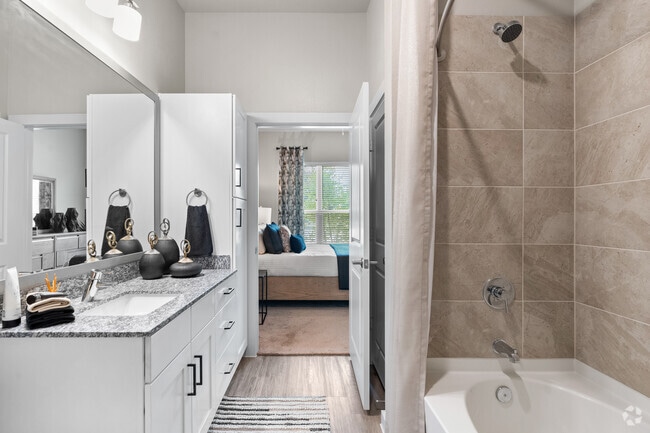 Neuhaus Apartments - Dormitorio principal 2HAB, 2BA - 1,007SF - Baño principal
