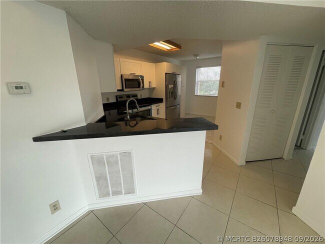 9033 Wiles Rd Unit 302