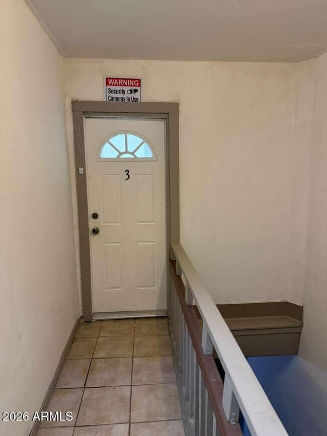 Building Photo - 1165 E 10th St Unit 3