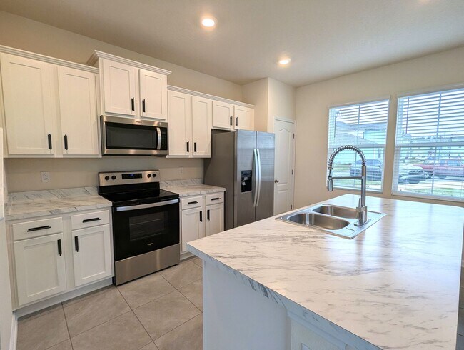 Photo - 18mo Lease on this NEWER BUILD and SPACIOUS 3 Bedroom, 2.5 Bath End Unit Townhome READY FOR MOVE-...