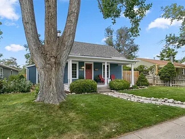 Photo - Charming 2 Bed 2 Bath house with Basement flex room in the heart of Englewood!