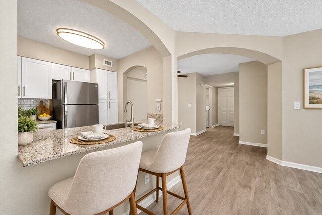 Step into the elegance of Mosaic. This beautifully designed kitchen boasts modern appliances, an open layout, and stylish finishes. Perfect for culinary enthusiasts and entertaining alike. Schedule your tour today and elevate your living!