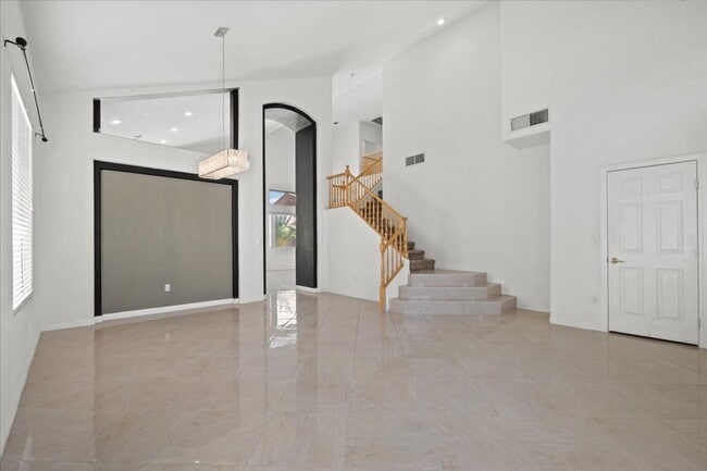 Photo - Contemporary Guard-Gated Retreat Near Rhodes Ranch Golf Club with Elegant Open-Concept Living