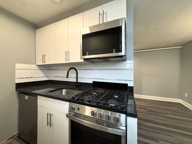 Building Photo - 1080 Massachusetts Ave Unit 3