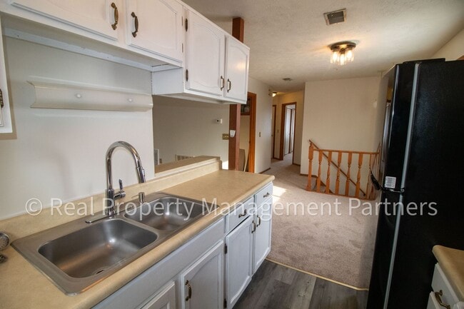 Photo - 2-Bed, 1-Bath Upper Unit with Garage & Porch – Steps from Paul Henry Trail