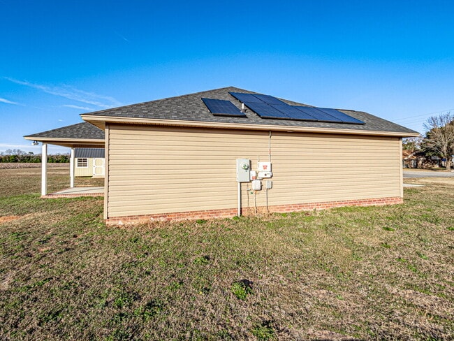 Photo - Available now! Has solar panels!