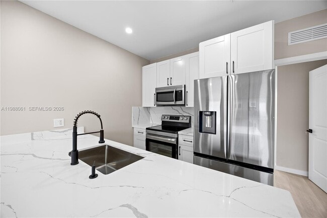 Photo - 630 NE 166th St Unit 3