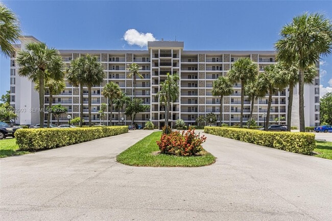Building Photo - 3150 N Palm Aire Dr Unit 705