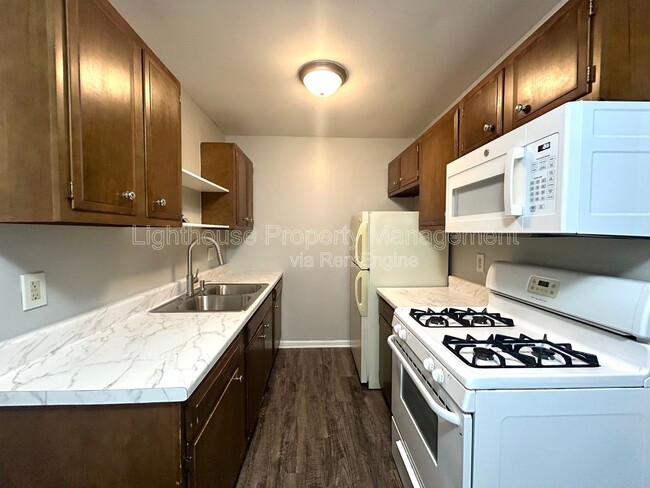 Building Photo - 1350 Kendall St SE Unit 156