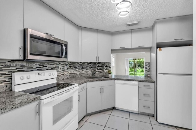 Photo - 10018 Hammocks Blvd Unit 101-5