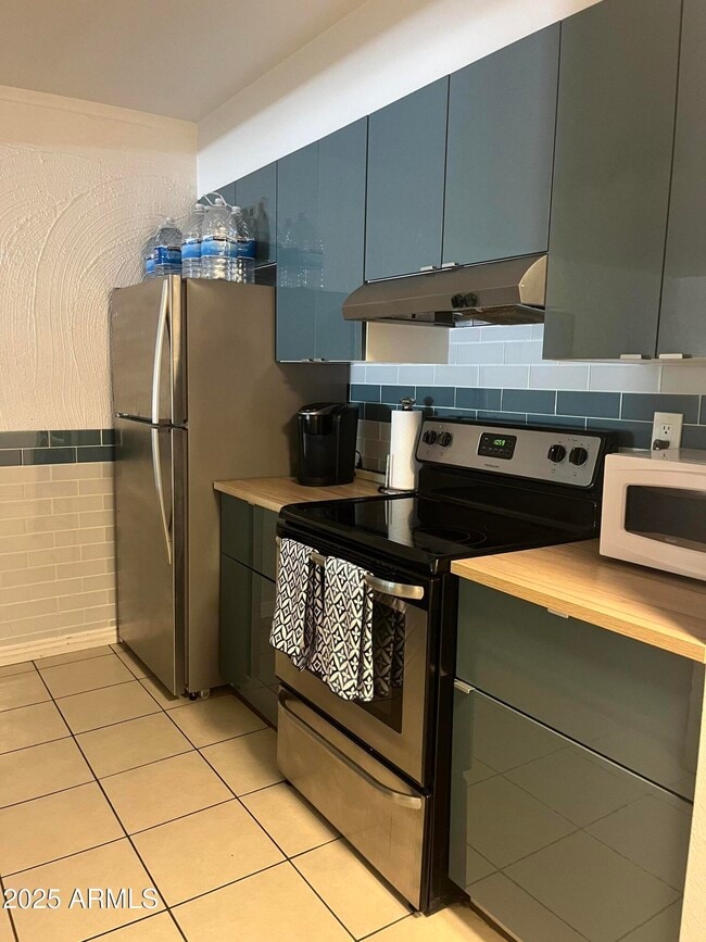Building Photo - 3313 N 68th St Unit 209