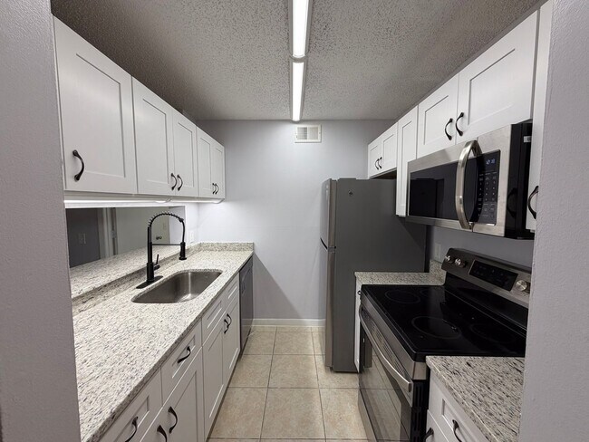 Photo - 4BR/4BA Condo off SW 34th Street - available NOW!