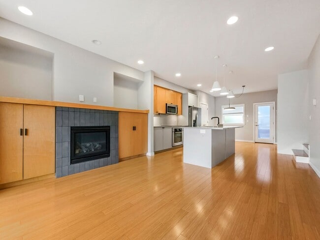 Photo - 3-Story Townhouse | 3 Bed, 3.5 Bath | Central Heating | Hardwood Floors | Carpeted Bedrooms | Off...