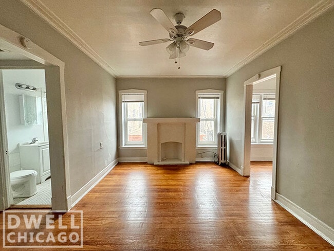 Building Photo - 6526 N Lakewood Ave Unit 1