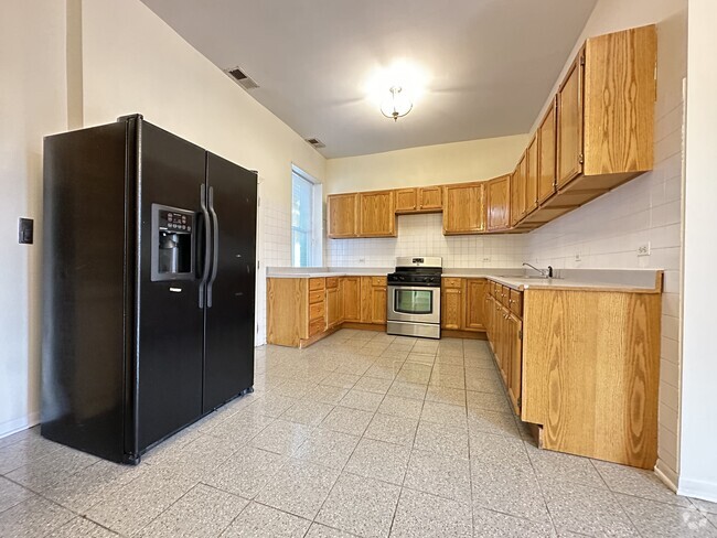 Building Photo - 1424 W Wilson Ave Unit 2 Rental