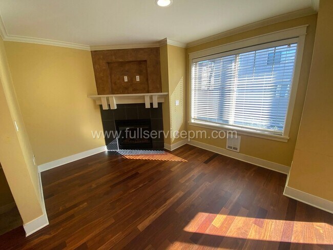 Photo - Spacious townhome with private backyard, garage parking, multiple decks, and a dedicated home off...