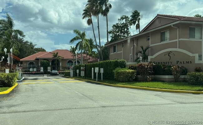 Building Photo - 3221 Sabal Palm Manor Unit 105