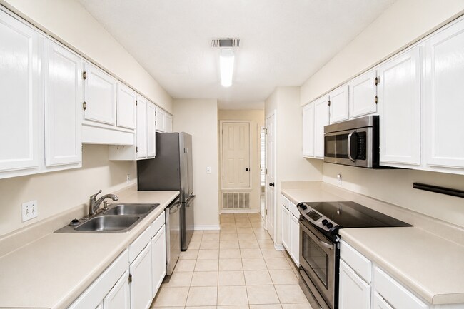 Photo - SW Pensacola Creek-Front Home with Screened Porch!