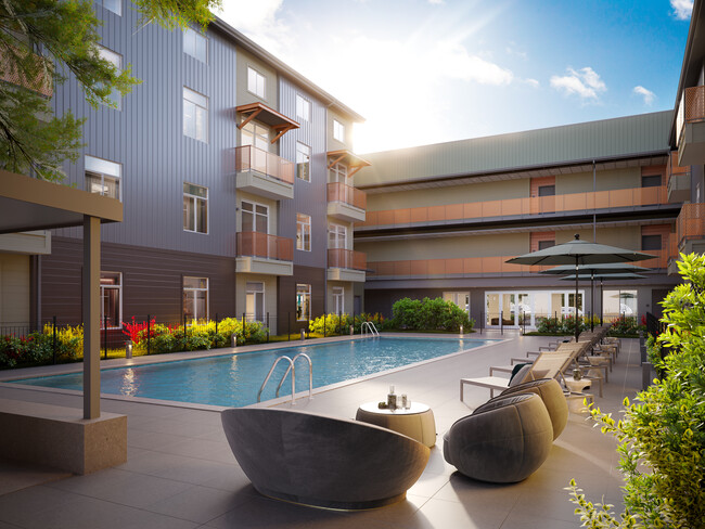 Refreshing pool with relaxing outdoor sitting area - MarCo At The Cannery Apartments