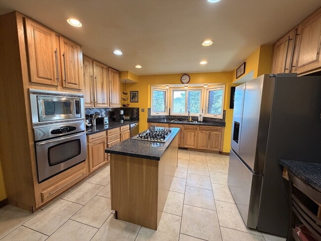 Photo - "Charming FULLY FURNISHED Evergreen Retreat: Spacious 4-Bed, 3-Bath Home on Fern Gulch Drive!"