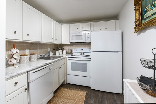 One Bedroom Kitchen - White Cabinets