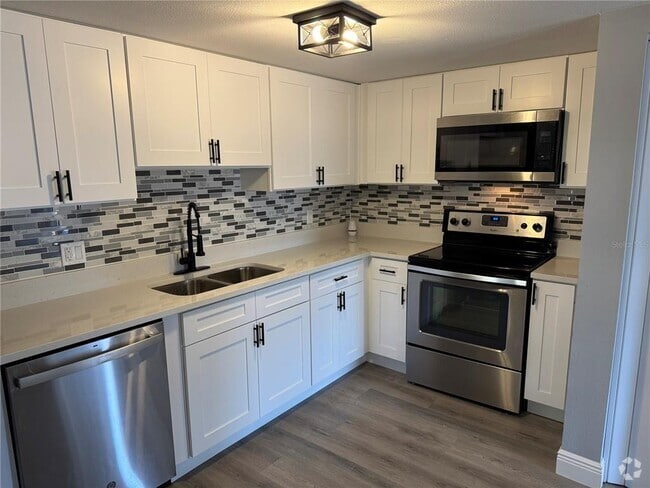 Building Photo - 8198 Fairways Cir Unit A204 Rental