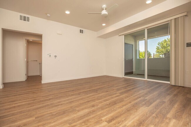 3x2 Living Room w/ Patio View - Mossdale Landing