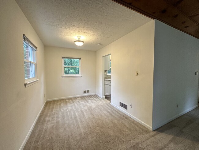 This classic brick rambler, located just around the corner from the West Falls Church Metro Stati...