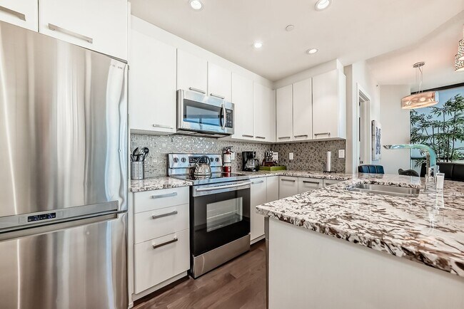 225-2110-211 11 Ave SE