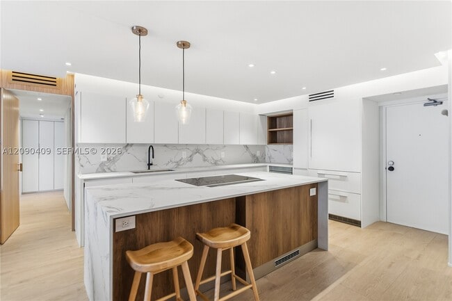 9195 Collins Ave Unit 903