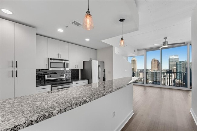 Building Photo - 860 Peachtree St NE Unit Spire 2311