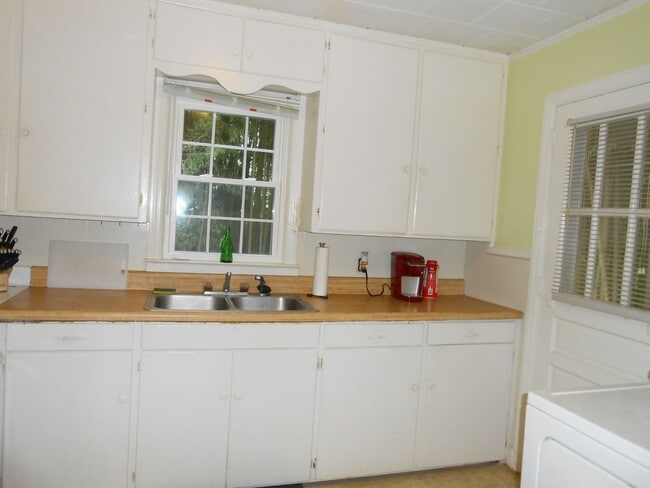 Photo - Ready in July 2026! Two bedroom, one level, one bath, off street parking!