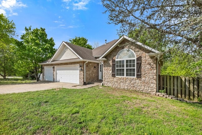 Photo - Charming 3-Bed, 2-Bath Home with 3-Car Garage & Fenced Yard