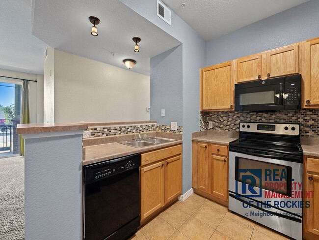 Photo - Bright 2 Bed 1 Bath Condo in a Great Location! Unidad C207
