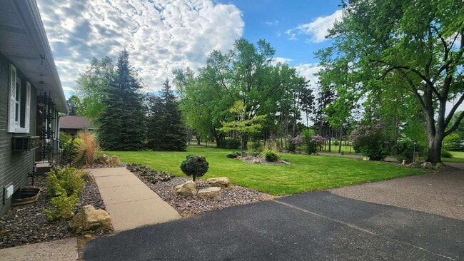 Photo - Spacious 4-Bedroom Home with Bonus Room, 3-Season Porch & Private Backyard