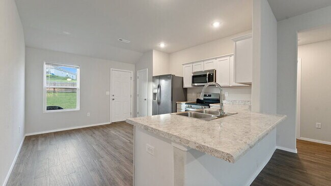 Photo - "Charming 4-Bedroom Home with Granite Touc...