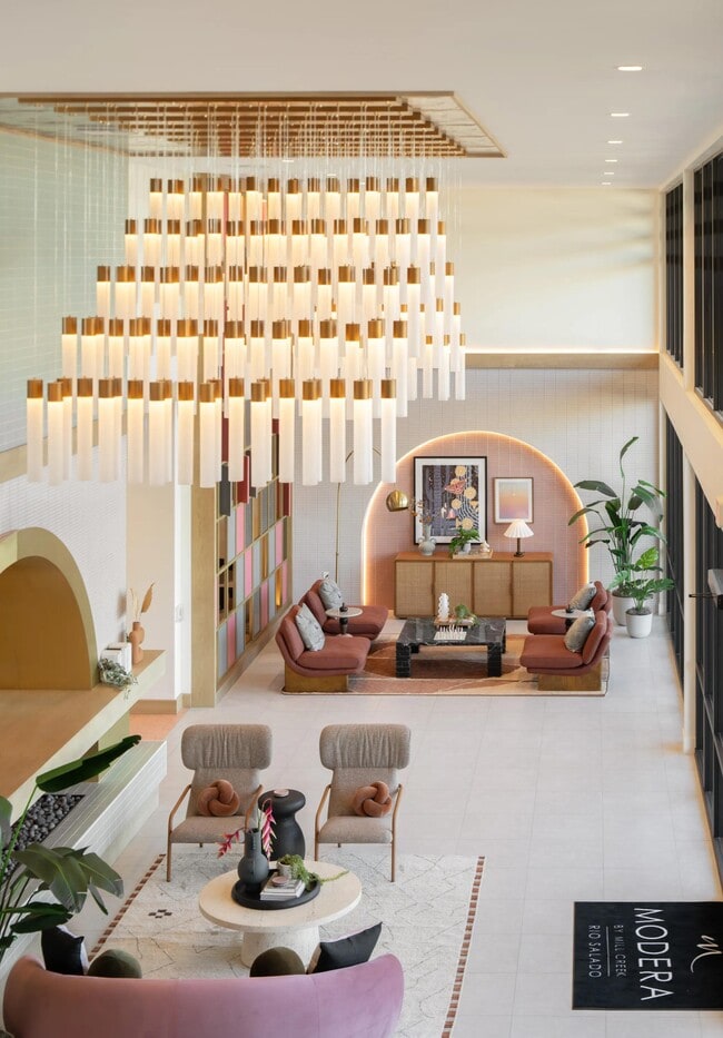 Statement lighting and desert-inspired design welcome you home at Modera Rio Salado in Tempe.