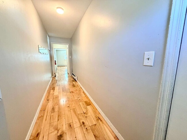 Photo - Move in July 1st • Spacious 1BR w/ Bonus Room Open Layout • Assigned Parking • Appliances • Garfield Unit B