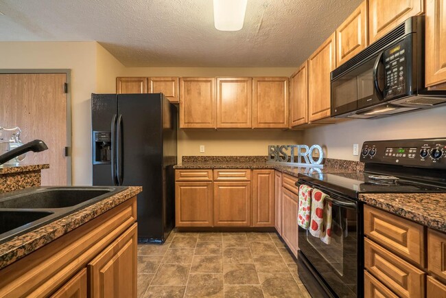 Our kitchens offer abundant cabinetry and sleek finishes, ideal for all your cooking needs.