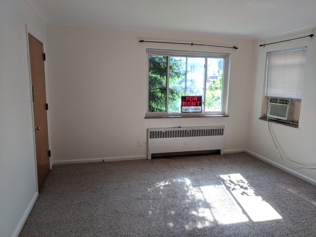 Main/front room looking to the front window - 716 S Ft Thomas Ave Unit 1