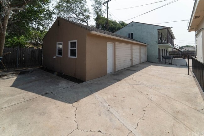 Back Building with Laundry Room and Garages - 9932 Mallison Ave Unit A