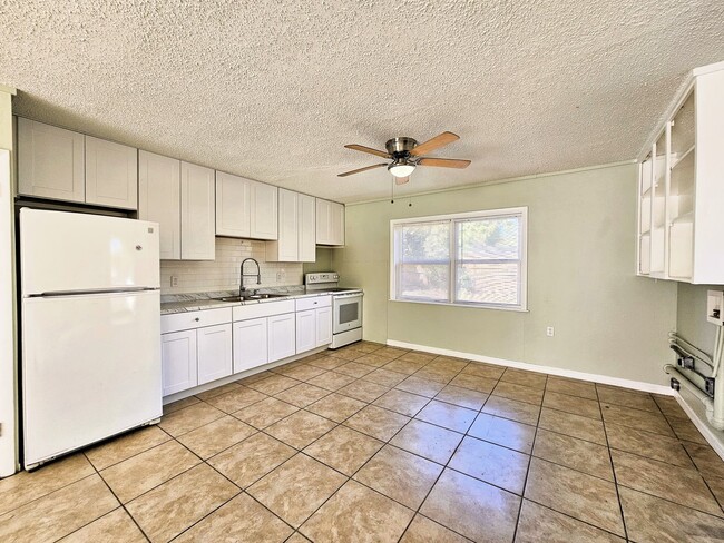 Photo - Welcome to a beautifully remodeled 2-Bedroom, 1-Bath in Mascotte, Florida, where modern comfort m...