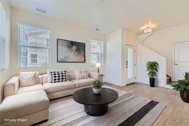 Photo - Modern 3BR Townhome | 2-Car Garage | Pool, Gym & Light Rail Access