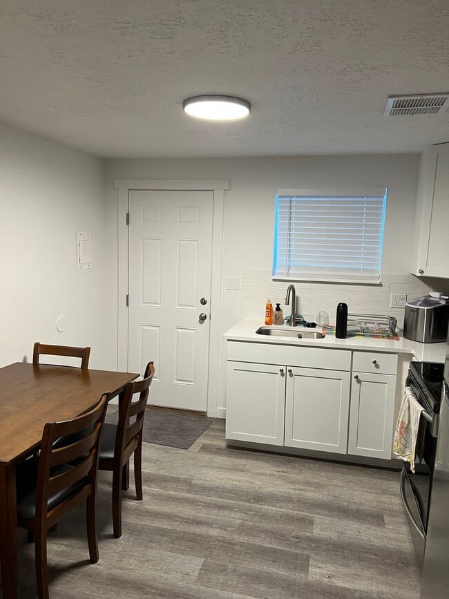 Photo - 2 Bedroom Apartment -2023 remodel New paint, flooring, and granite countertops Unit 1434